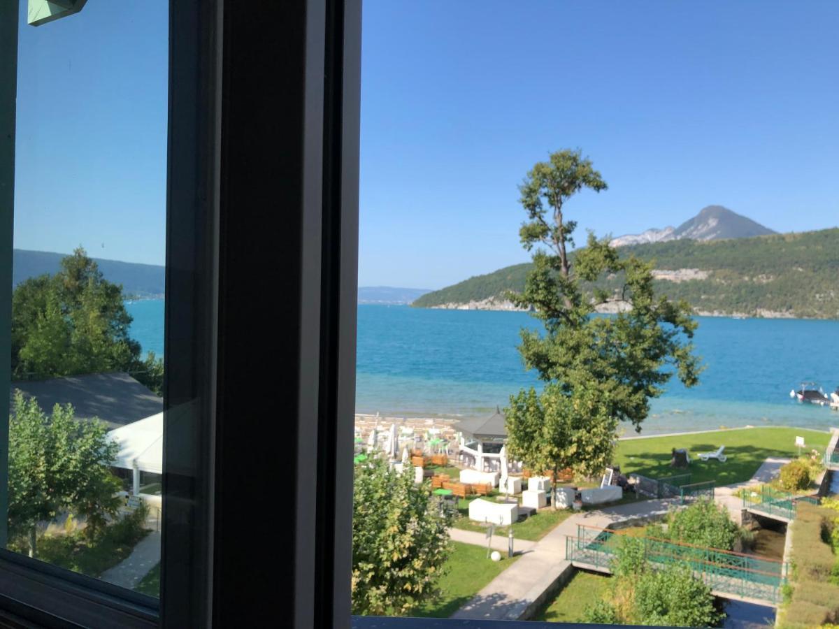 Logement atypique avec vue unique panoramique sur le lac d’Annecy, dans une résidence avec plage et ponton privée sur la commune de Duingt  Exterior foto